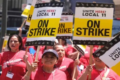 L.A. Grand Hotel workers striking outside City Hall